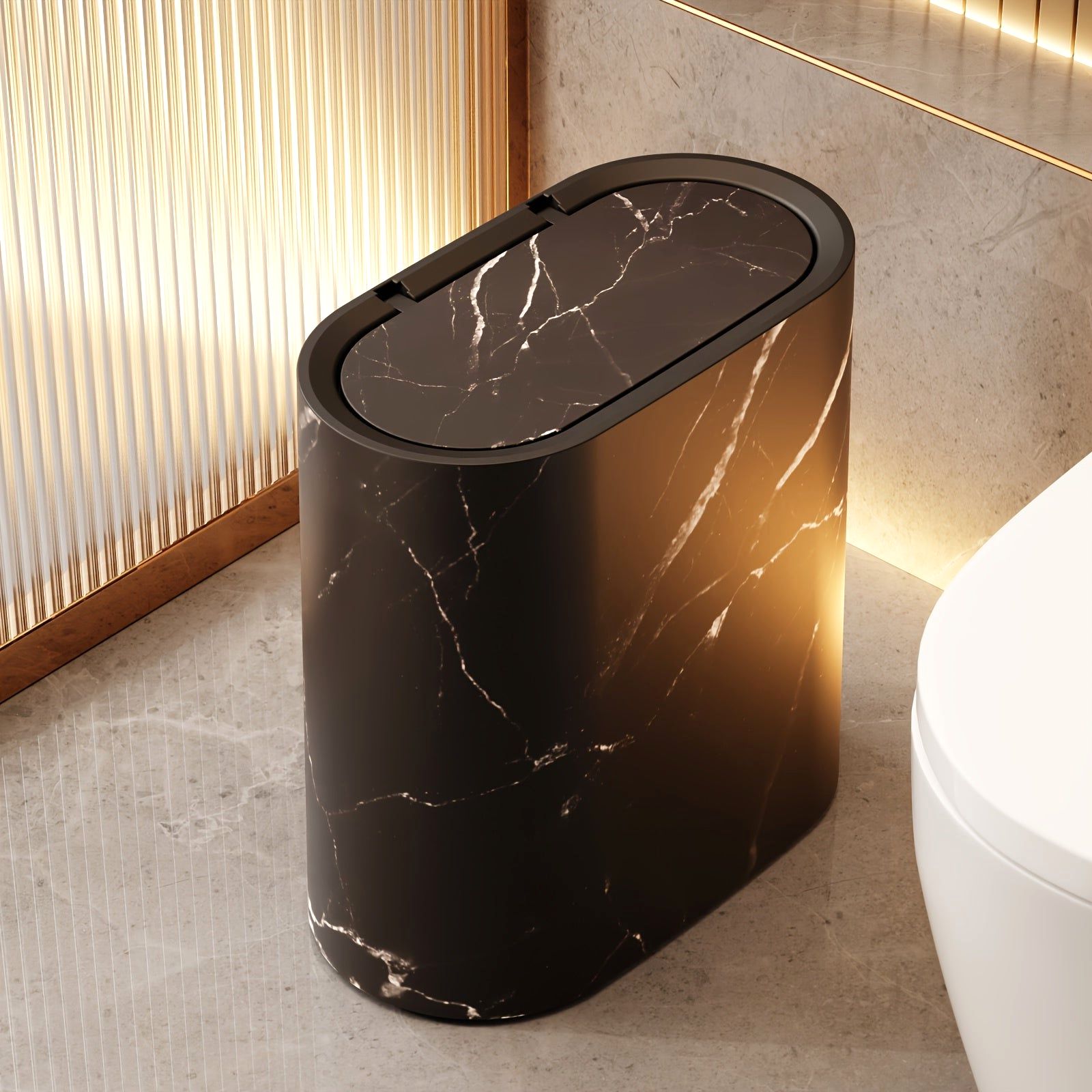 A single Luxe Marble Canister in Marble Black, an elegant trash solution for a modern bathroom. This stylish waste bin features a secure lid and contemporary design.