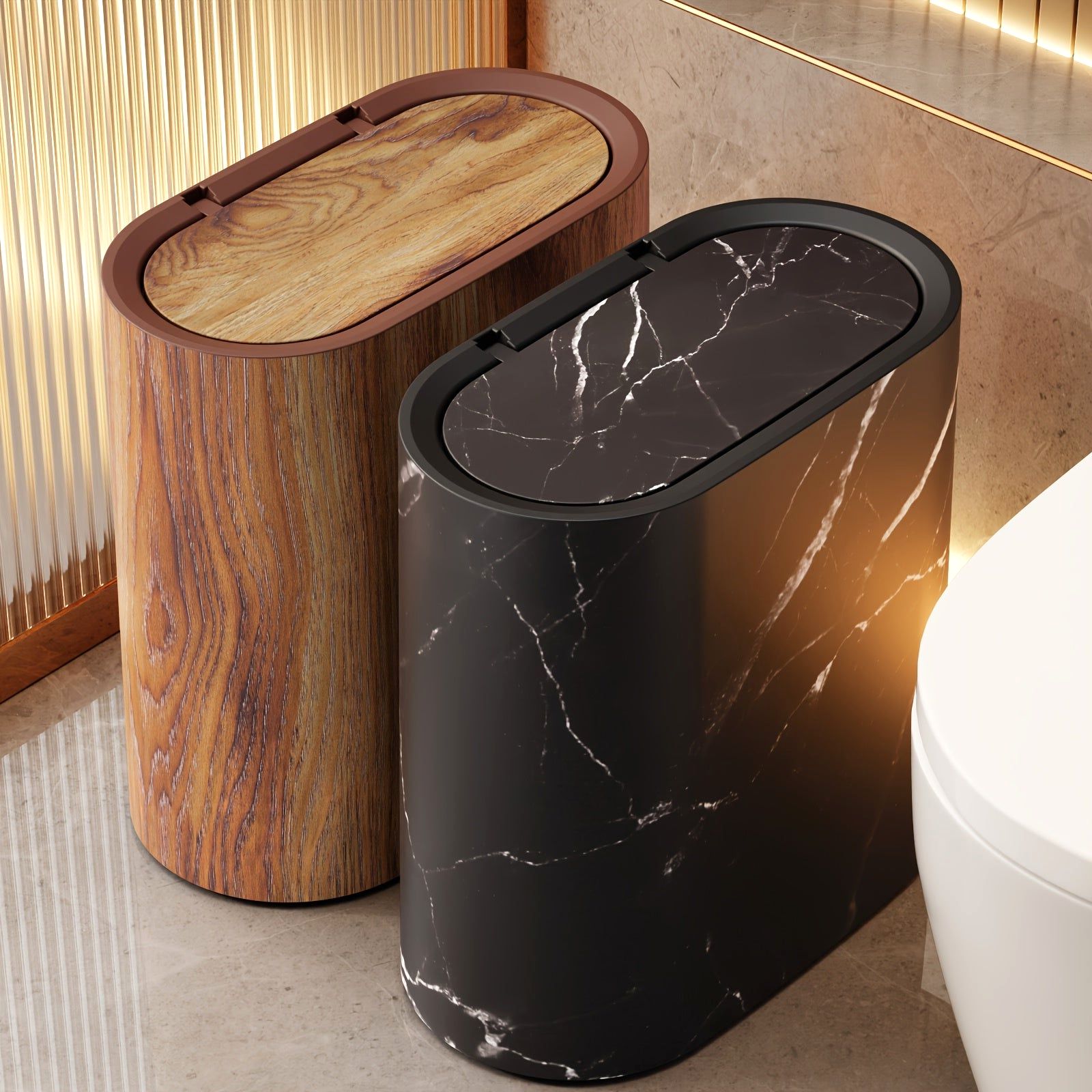 Two Luxe Marble Canisters, one in Marble Black and one in Imitation Wood Grain, standing in a modern bathroom. These stylish waste bins offer an elegant trash solution for contemporary decor.